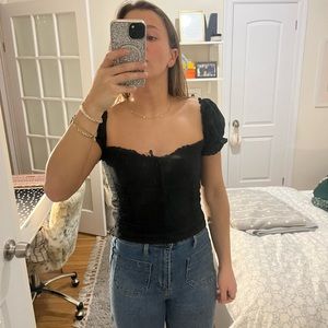 Reformation size 4 short puff sleeve black top with black embroidery